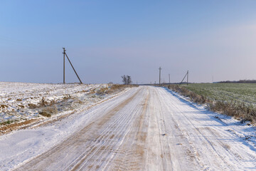 A road covered with snow and ice for cars