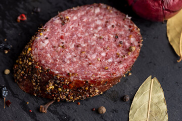 Sliced salami using pork meat with spices