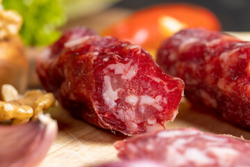 Veal sausage on the table during cooking