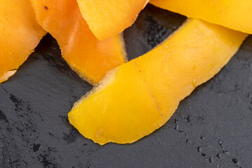 peeled with a thin layer of ripe persimmon peel