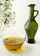 Fondo con Aceite de oliva, botella y ramas de olivo