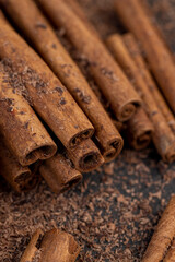 solid aromatic cinnamon on the table in chocolate