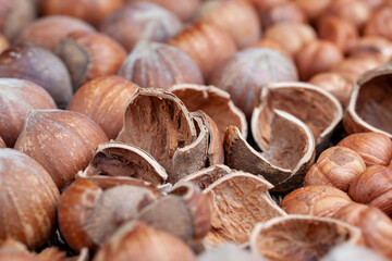 Fototapeta premium peeled hazelnut nuts close-up on the table