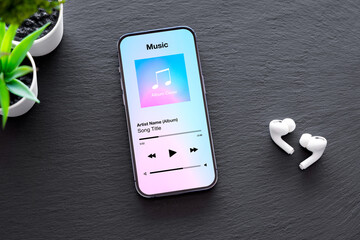 Music player on mobile phone and wireless earphones - 588224991