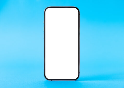 Empty mobile phone's screen on light blue background