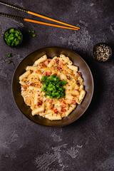 Spicy Rice Cake with Cheese and Bacon or Cream Teokbokki, Tteokbokki.