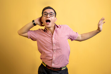 Man with eyeglasses and a shirt standing