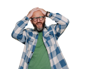 Failure! Mid adult beardy man in glasses puts hands on head in frustration in plaid shirt stands against transparent background with copy space. Unhappy caucasian man looks at camera with upset face.