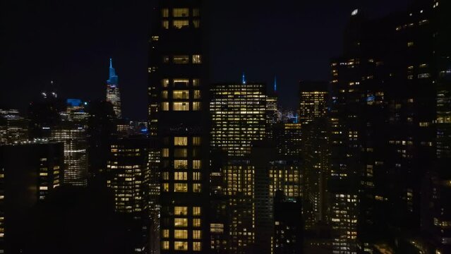 Aerial view around skyscrapers at the Billionaires' Row, night in New York, USA