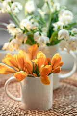 Spring composition with snowdrops and crocuses, close up.