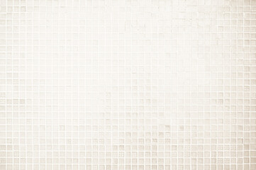 Cream light ceramic wall chequered and floor tiles mosaic background in bathroom. Simple seamless abstract surface clean.
