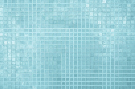 Blue ceramic wall and floor tiles abstract background. Design geometric mosaic texture for the decoration of the bedroom.
