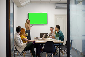 Business team on a morning briefing; business meeting and presentation in a modern office