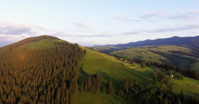 mountain scenery in summer, view from a drone. the Carpathians and Polony Mountains. a village in the mountains. sunset