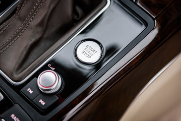 Button engine start and engine stop. Car dashboard with focus on engine start stop button, car...