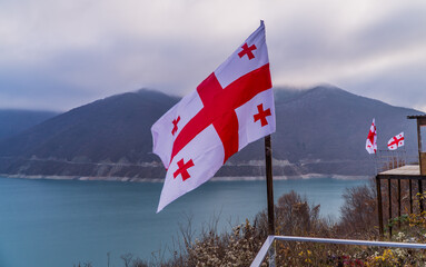 Georgian flag at Zhinvali water reservoir in Zhinvali, Georgia