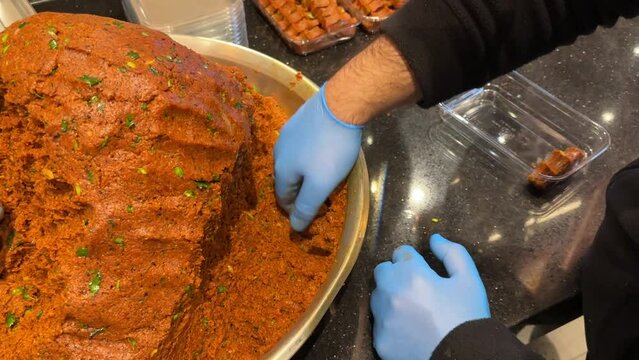Turkish raw meatballs. Raw meatballs in a copper pan. local name ciğ k&ouml;fte