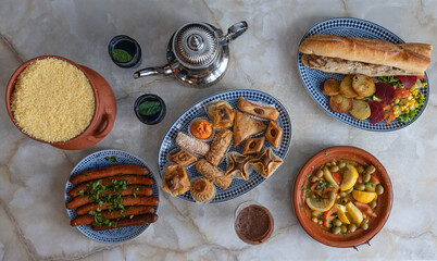 Paris, France - 12 09 2023: Tunisian dishe culinary Still Life. Mix of Tunisian dishes top view.