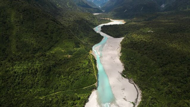 Drone shot of Whanganui river. amethyst river hot pools. newton peak in new Zealand. beautiful vast nature with blue rivers.
