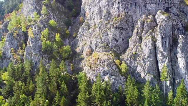 Rock Climbers Resting on Blue Hammocks Atop a Limestone Rock Formation in Baia De Fier, Romania- A Stunning Aerial View