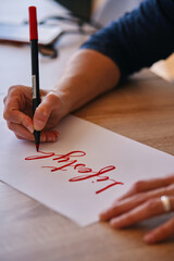 woman doing lettering, lifesytle word concept