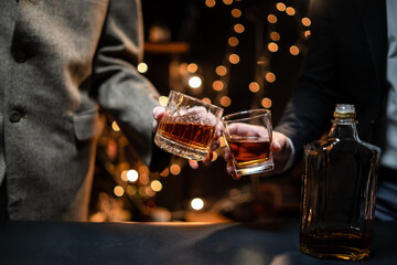 Businessman pouring whiskey victory drink