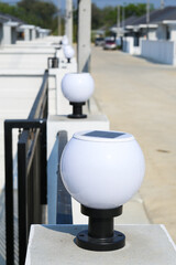 Solar post-mounted lamp