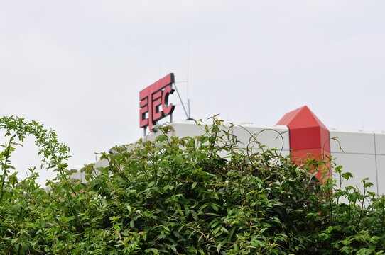 Selective focus of green plants against ETEC Company in Essen, Germany