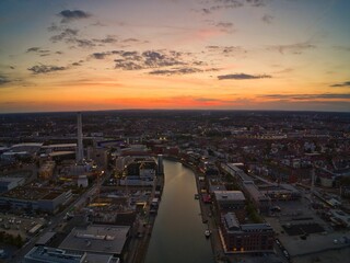 Fototapeta premium Aerial view of the Munster harbor at sunset in Munster, Germany.