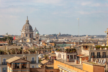Fototapeta na wymiar Panoramic view of Rome, Italy, from above towards Vatican City with St. Peter's Basilica in the background.