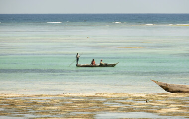 Wooden sailboat in a sea with tourists 