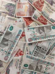 Fototapeta na wymiar background of banknotes - Egyptian currency - Egyptian pounds