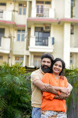 Young indian couple laughing ,funny and spending time to each other, at park.
