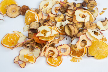 Healthy vegetarian food concept. Assortment of dried fruits, nuts and seeds on white background. Top view. Mixed nuts set closeup.