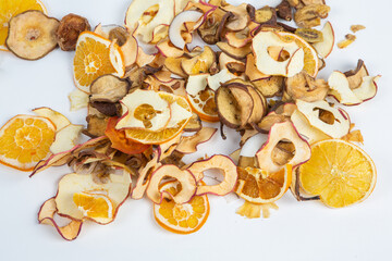 Dried fruits isolated on white background. Healthy eating concept. Top view. Healthy vegetarian food concept. Dried fruit chips.