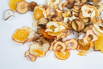 Dried fruits isolated on white background. Healthy eating concept. Top view. Healthy vegetarian food concept. Dried fruit chips.