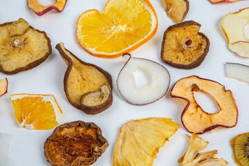 Dried fruits isolated on white background. Healthy eating concept. Top view. Healthy vegetarian food concept. Dried fruit chips.