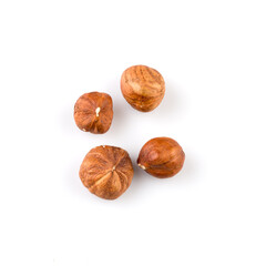 Hazelnuts on the white background