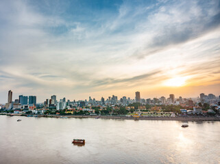Phnom Penh sunset,as river cruise boat floats along Tonle Sap river towards the Mekong,Cambodia.