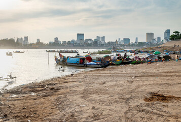 Sunset view of Phnom Penh city skyline,from east side of Tonle Sap River,Phnom Penh,Cambodia.