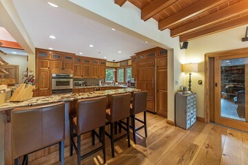 Interior shot of a kitchen with wooden details.