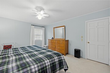 Interior of a cozy bedroom with a full bed