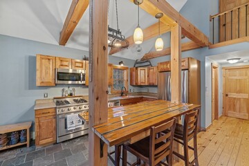 Fototapeta na wymiar Rustic design kitchen and dining area in an elegant house