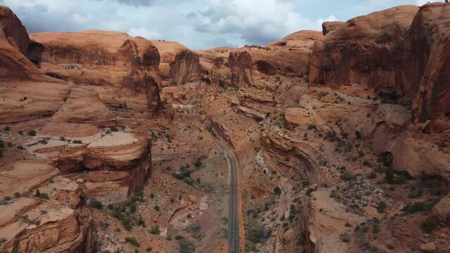 Aerial Of Bootlegger Canyon With Corona Arch And Railway At Moab In Utah, United States. Wide shot