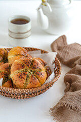 korean cream cheese garlic bread in rattan basket
