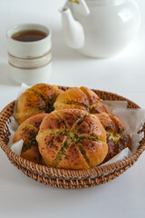 korean cream cheese garlic bread in rattan basket
