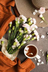 still life a cup of tea and flowers
