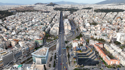 Naklejka premium Aerial drone photo of landmark buildings in Syggrou Avenue urban cityscape, Athens centre, Attica, Greece