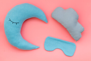 Good night concept. Sleep mask and moon pillow, top view