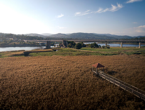 Aerial view of Vikings towers, Torres de Oeste and natural marshes by Ulla river in Catoira, Pontevedra, Galicia, Spain.